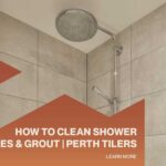 Modern tiled shower with grey wall tiles and text overlay reading "How To Clean Shower Tiles & Grout | Perth Tilers".